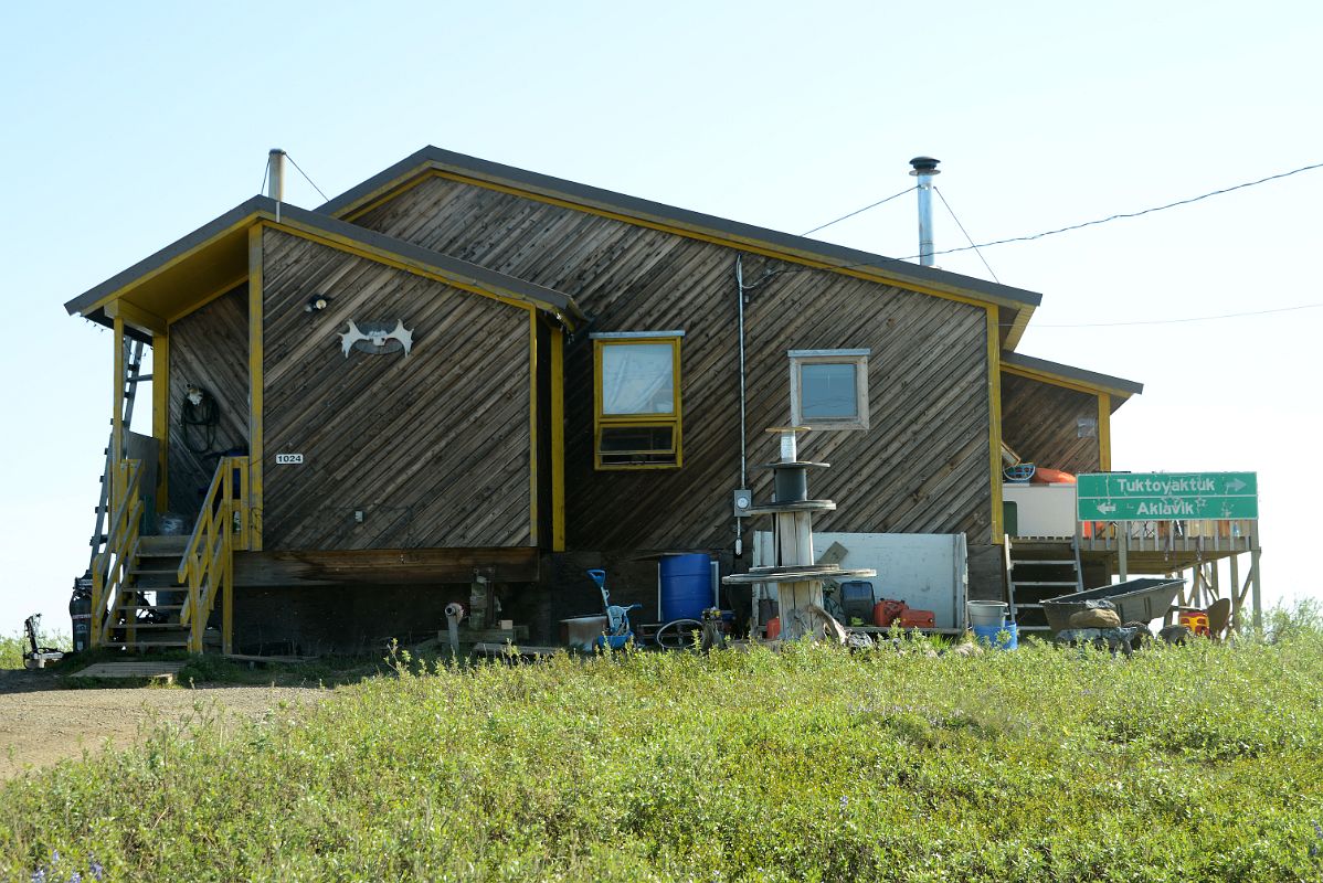 27B House With Road Sign For Aklavik And Tuktoyaktuk Northwest Territories